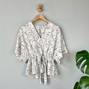 Sweet Rain Front Tie Printed Blouse